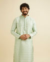 Soft Green Jaal Patterned Kurta Set with Floral Buta Motifs